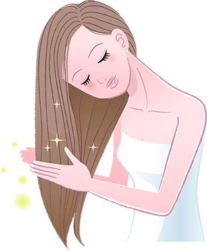 Young pretty woman stroking her shiny long hair